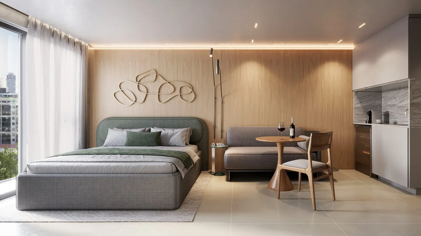 Studio do Lumini com face sul, cama, estar e kitchenette